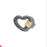 Twisted Heartlock in Mixed Metals